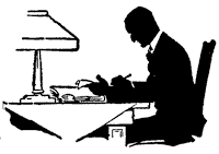 man writing at a desk with lamp